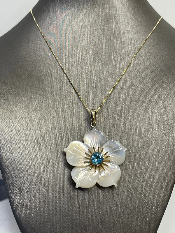 women's necklaces with birthstone -10 Karat Yellow Gold Blooming Mother of Pearl Flower With Blue Topaz Necklace